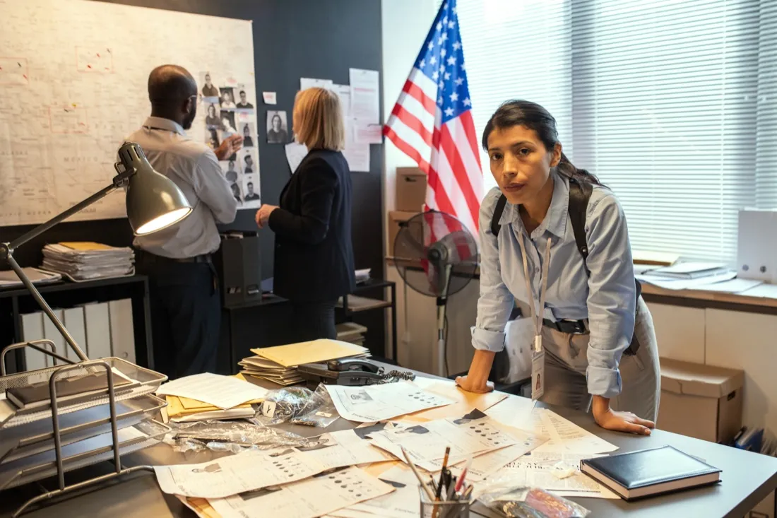 Investigator working in an office