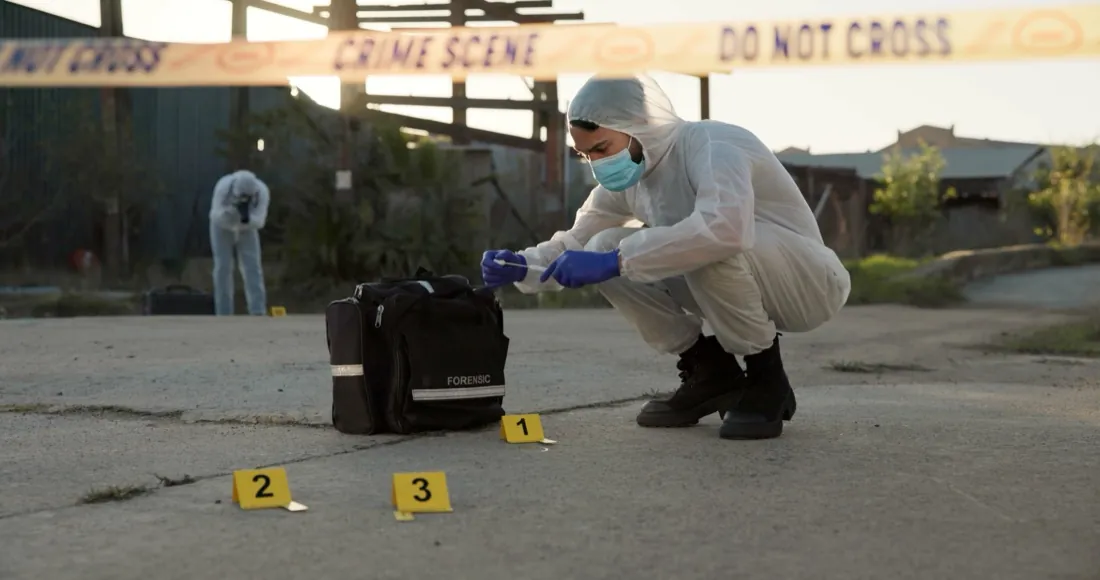 Forensics professional working at a crime scene